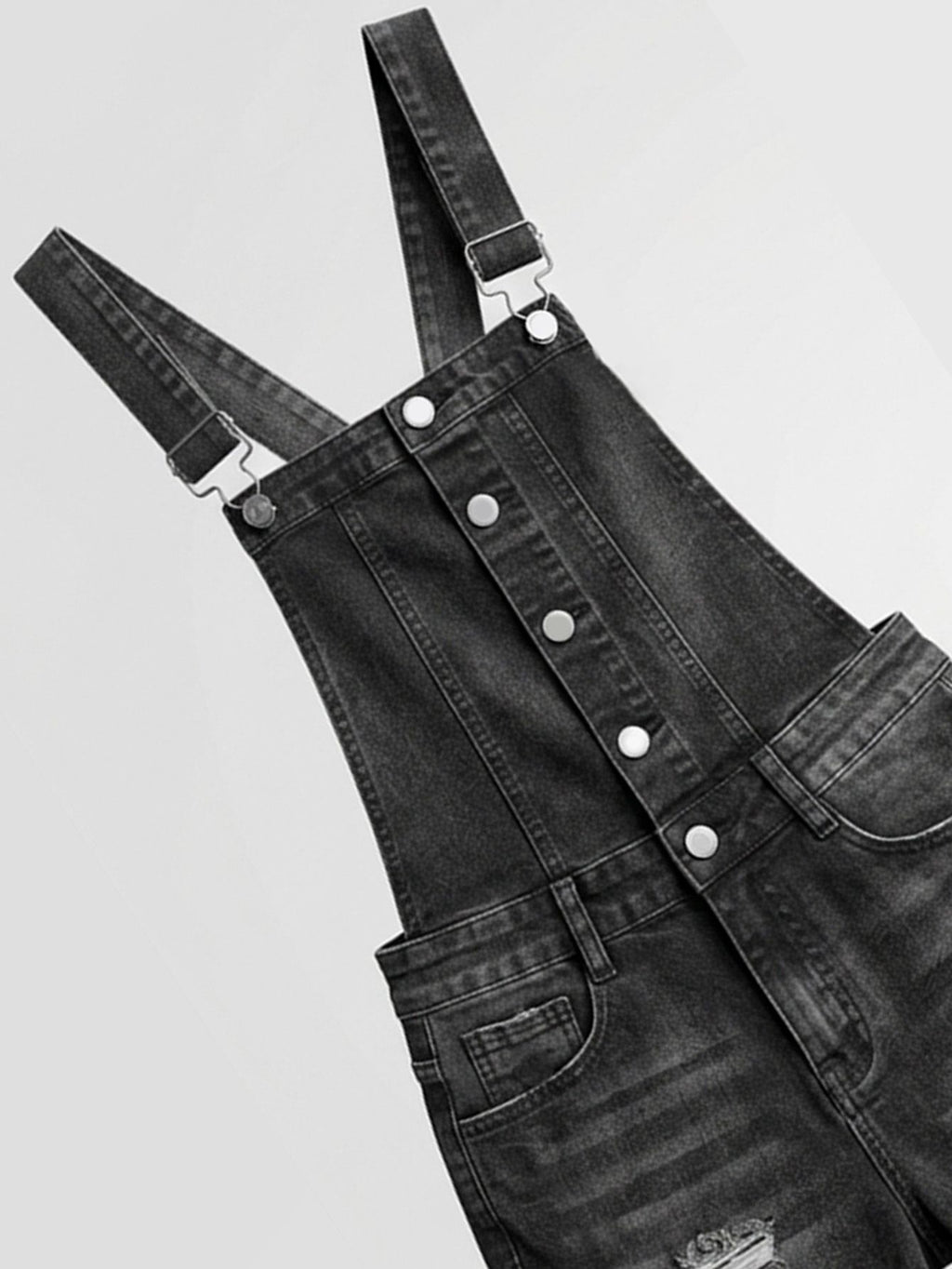 Salopettes en jean déchiré pour femme