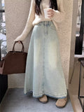 Jupe mi-longue en denim délavé clair, style rétro